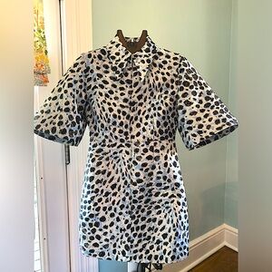 A Gianni dress.  Worn once!  Very fun fabric and color combination.